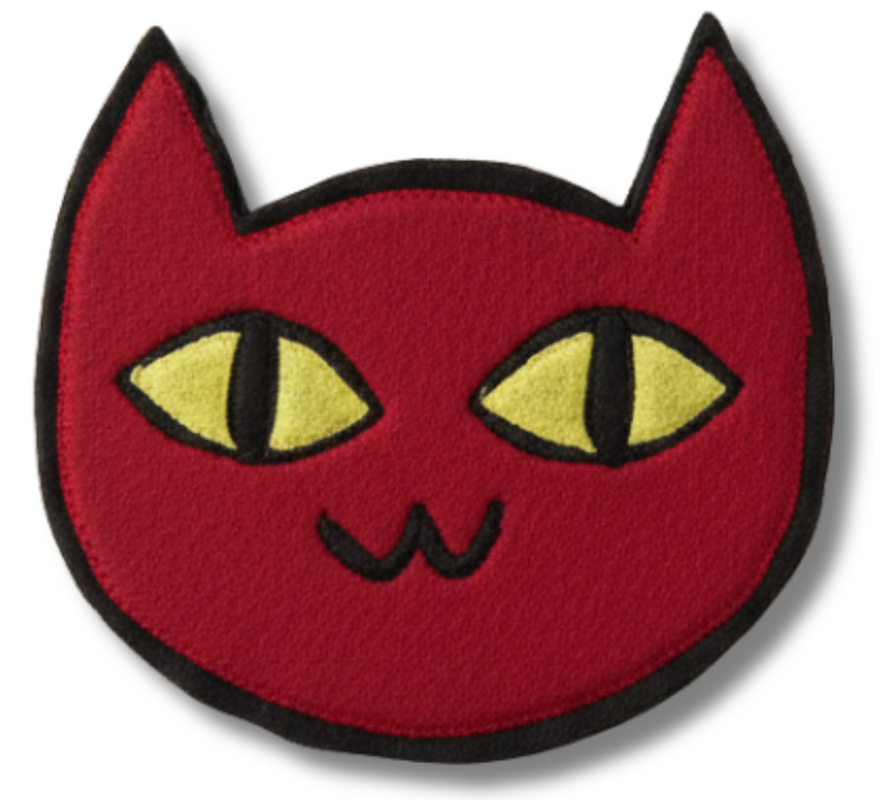 Red cat face patch with yellow eyes on a white background